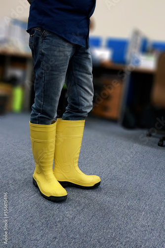 Yellow safety boots for workers, to protect their feet from work accidents