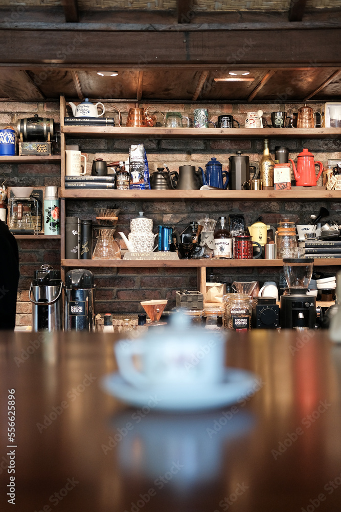 vintage coffee cups, antique cup, interior of a bar, interior of a cafe, old shop, antique shop
