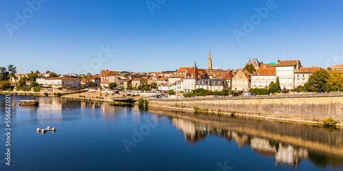 France, Nouvelle-Aquitaine, Bergerac, Dordogne River with old town buildings in background