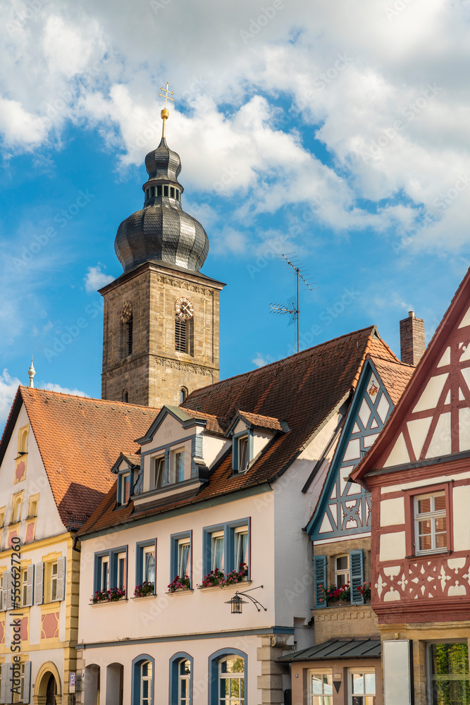 Germany, Bavaria, Forchheim, Historic houses with bell tower of St. Martin church in background Germany, Bavaria, Forchheim, Historic houses with bell tower of St. Martin church in background