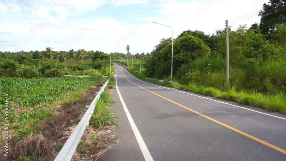 Empty road in countryside with tilt up shot Empty road in countryside with tilt up shot