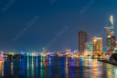 Ho Chi Minh City  Vietnam - December 26  2022  Beautiful night in Ho Chi Minh city known as Saigon  one of the big cities is developed in Vietnam. See Bitexco tower  saigon river and center city view 
