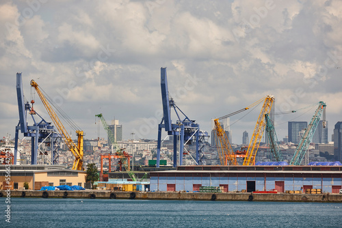 Cranes at comercial seaport. Bosphorus strait in Istanbul. Transportation Turkey © h368k742