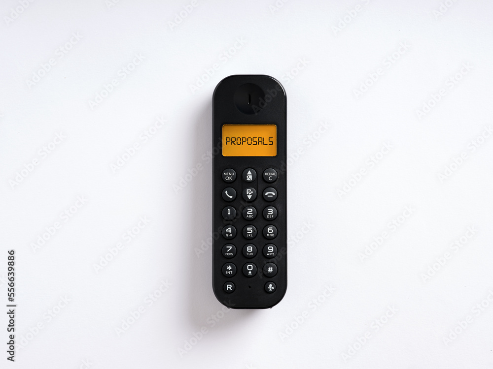 The word proposals written on the screen of a wireless phone. Telemarketing service phone promotion offer concept. The word proposals written on the screen of a wireless phone. Telemarketing service phone promotion offer concept.