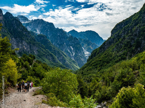 Hikers in the mountains in Theth valley in Albania