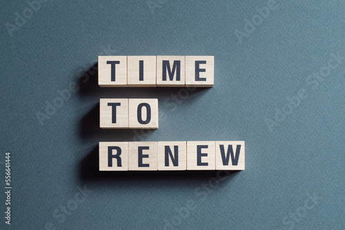 Time to renew - word concept on cubes photo