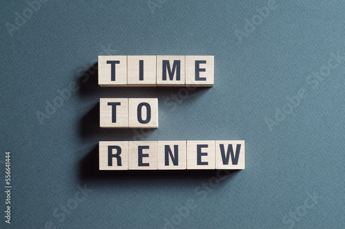 Time to renew - word concept on cubes
