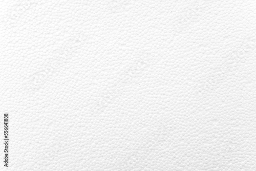 White foam plastic or styrofoam as texture or background, top view, space for text photo