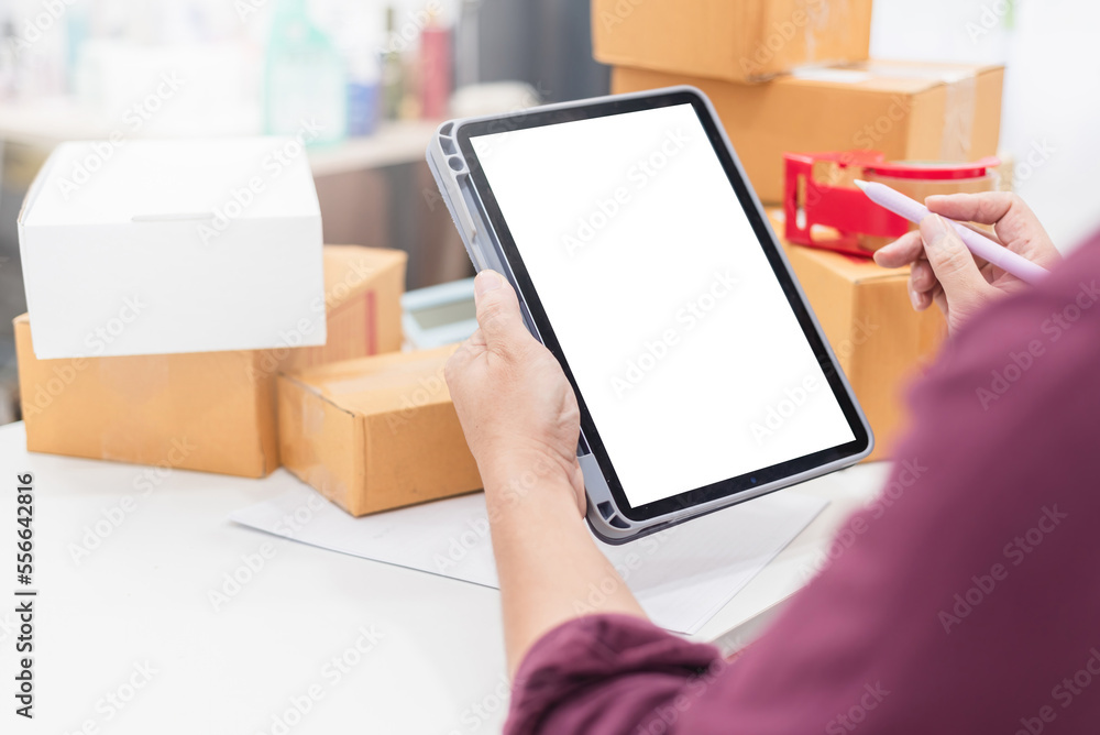 Selling products online and logistics concept, people holding blank white digital tablet with clipping path, taking order and delivery.