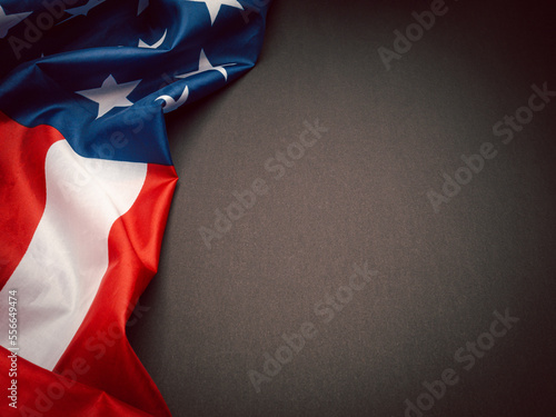 The American flag is on a black background with copy space for text