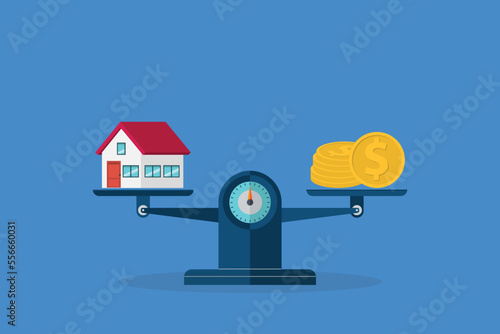 Investment in real estate. House, coins, weight scales.	