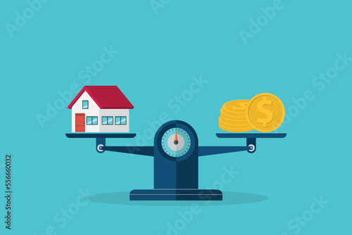 Investment in real estate. House, coins, weight scales.	