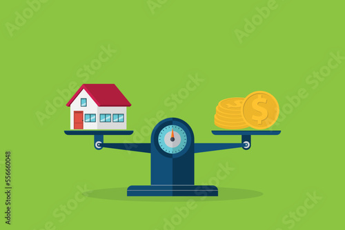 Investment in real estate. House, coins, weight scales.	