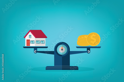 Investment in real estate. House, coins, weight scales.	