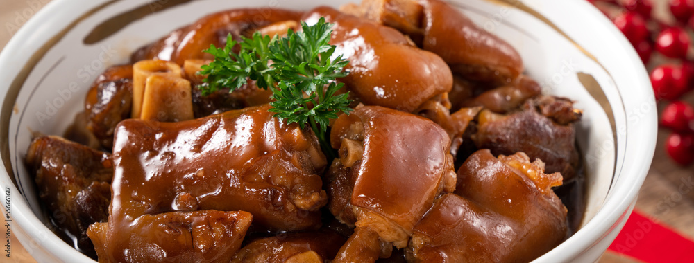 Taiwanese traditional food pork knuckle in a bowl for Chinese Lunar New Year meal. Taiwanese traditional food pork knuckle in a bowl for Chinese Lunar New Year meal.