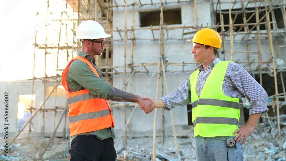 Slow Motion Successful work partner handshake showing project success . The workers are happy with the deal agreement . Slow Motion Successful work partner handshake showing project success . The workers are happy with the deal agreement .