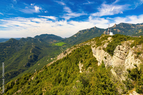 View of the top of the Figassa viewpoint, with the mountains of Ensija and the Rasos de Peguera from the Figuerassa viewpoint, Bergueda, Catalonia, Spain