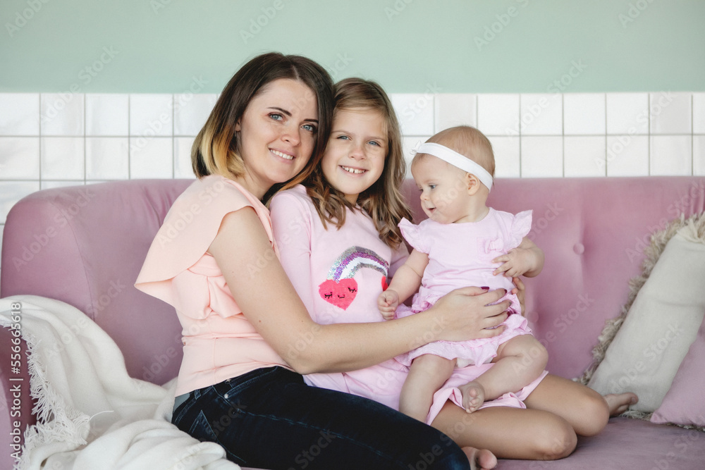 Mother and daughters happy at home Mother and daughters happy at home