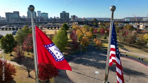 Arkansas State Flag with USA American flag during autumn day. Aerial view. photo