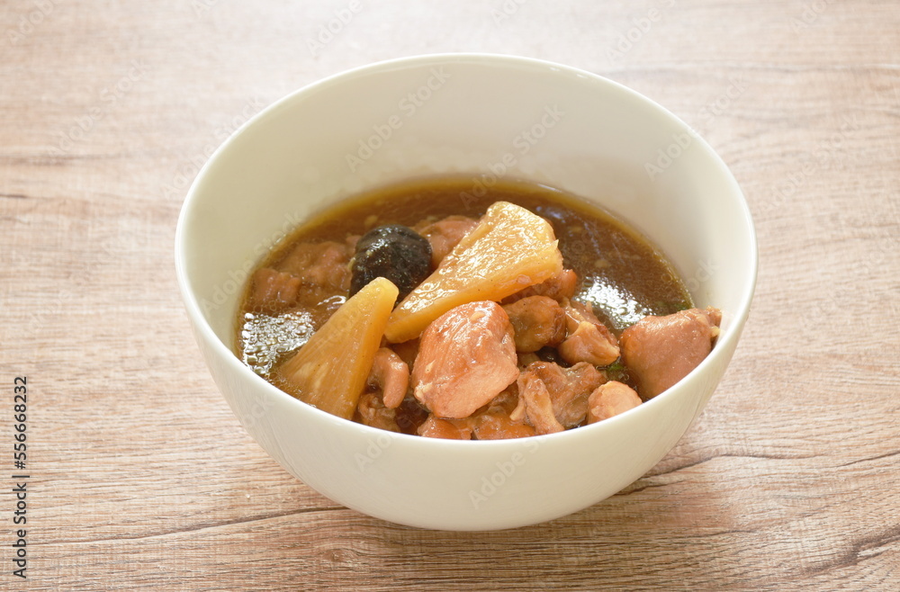boiled chicken meat with pineapple in sweet red gravy sauce stew on bowl boiled chicken meat with pineapple in sweet red gravy sauce stew on bowl