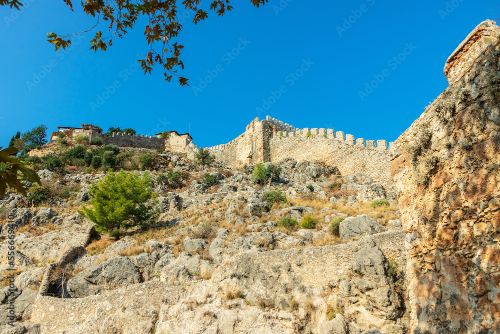 Crenelated walls of Alanya Castle in Southern Turkey belongs to magnificent Seljuk ruin with local name of Alanya Kalesi.
