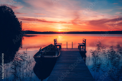 Fotografiet Sunset on a lake