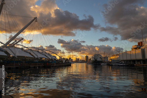 GENOA, ITALY, DECEMBER 5, 2022 - View of the Ancient Port of Genoa at sunset with sky covered with clouds, Italy