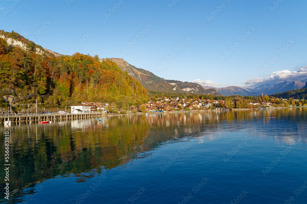 Beautiful scenic autumn landscape with Lake Brienz in the foreground at Bernese Oberland, Canton Bern, on a sunny autumn afternoon. Photo taken October 18th, 2022, Brienz, Switzerland. Beautiful scenic autumn landscape with Lake Brienz in the foreground at Bernese Oberland, Canton Bern, on a sunny autumn afternoon. Photo taken October 18th, 2022, Brienz, Switzerland.
