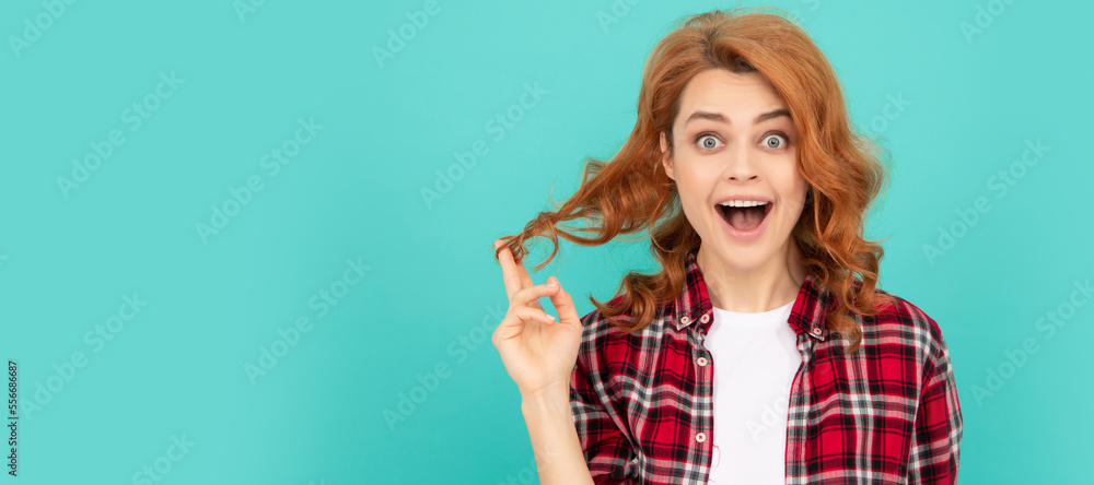 amazed redhead woman with curly hair in checkered casual shirt, fashion. Woman isolated face portrait, banner with mock up copyspace. amazed redhead woman with curly hair in checkered casual shirt, fashion. Woman isolated face portrait, banner with mock up copyspace.