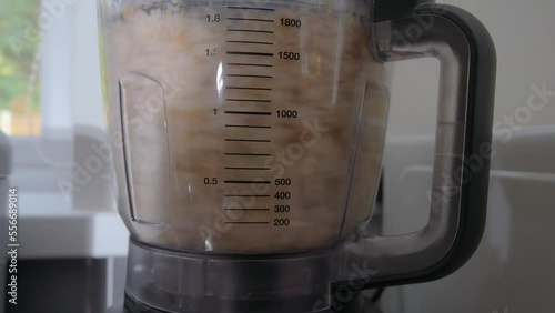 preparing home made fresh toasted breadcrumbs in an electric food processor for immediate use 
