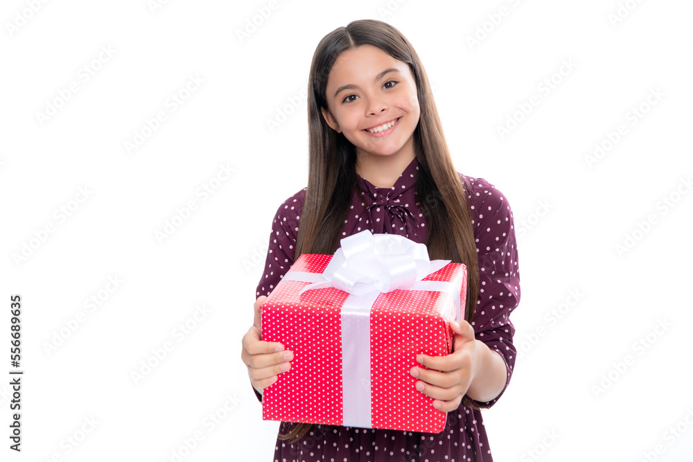 Portrait of happy smiling teenage child girl. Teenager kid with present box isolated on white background. Teen girl giving birthday gift. Present, greeting and gifting concept. Portrait of happy smiling teenage child girl. Teenager kid with present box isolated on white background. Teen girl giving birthday gift. Present, greeting and gifting concept.
