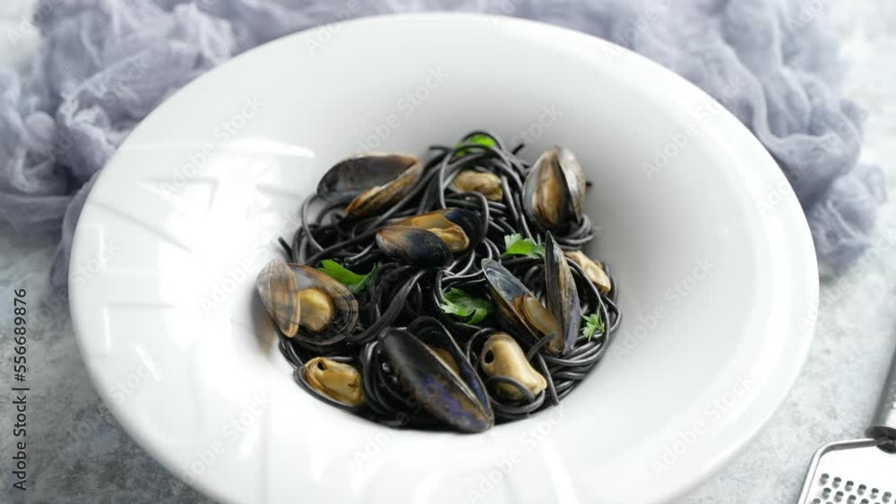 Freshly catch mussels Served on white plate Freshly catch mussels Served on white plate