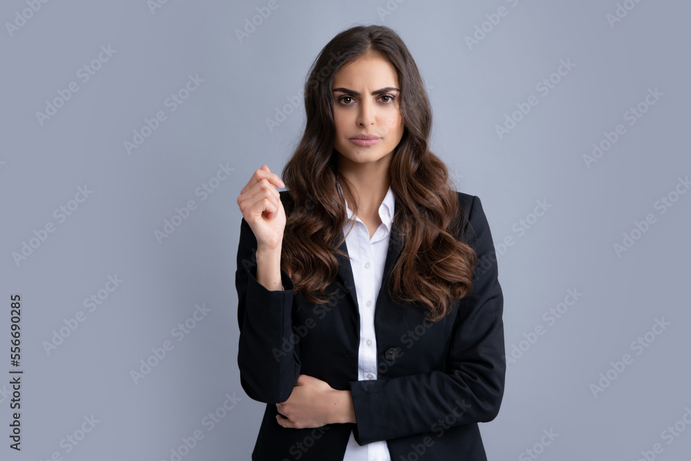 Portrait of successful business woman in suit on gray isolated background. Serious office female worker, manager employees. Female office worker, success manager. Portrait of successful business woman in suit on gray isolated background. Serious office female worker, manager employees. Female office worker, success manager.