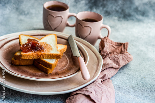 Morning food with tea and toasts photo