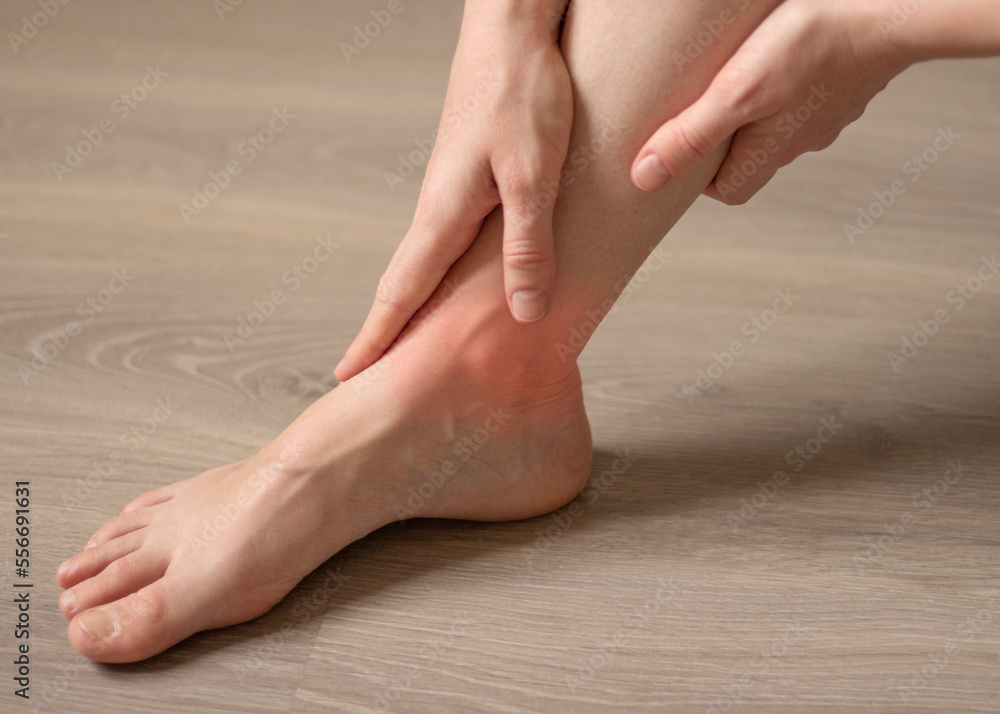 Pain in the legs. Women feet on the floor close up. Orthopedic Disease joints, muscles. Health problem Pain in the legs. Women feet on the floor close up. Orthopedic Disease joints, muscles. Health problem