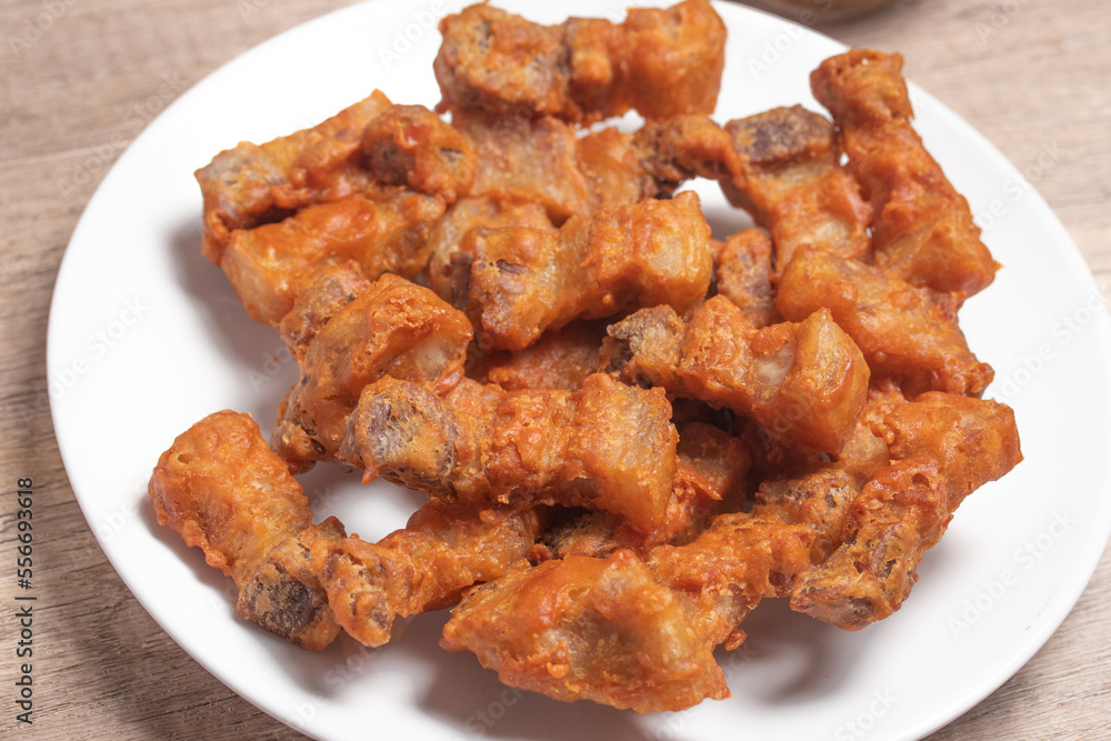 Deep fried pork belly with fish sauce and spicy dipping sauce Deep fried pork belly with fish sauce and spicy dipping sauce