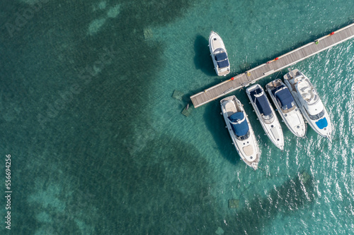 Fotografia Moored boats at the pier top view