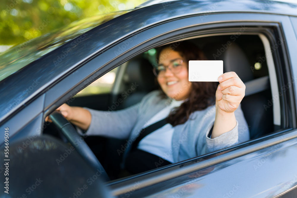 Cheerful woman getting her driver's license