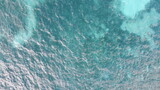 a drone flight over a caribbean island the coast from above dreamlike sea
