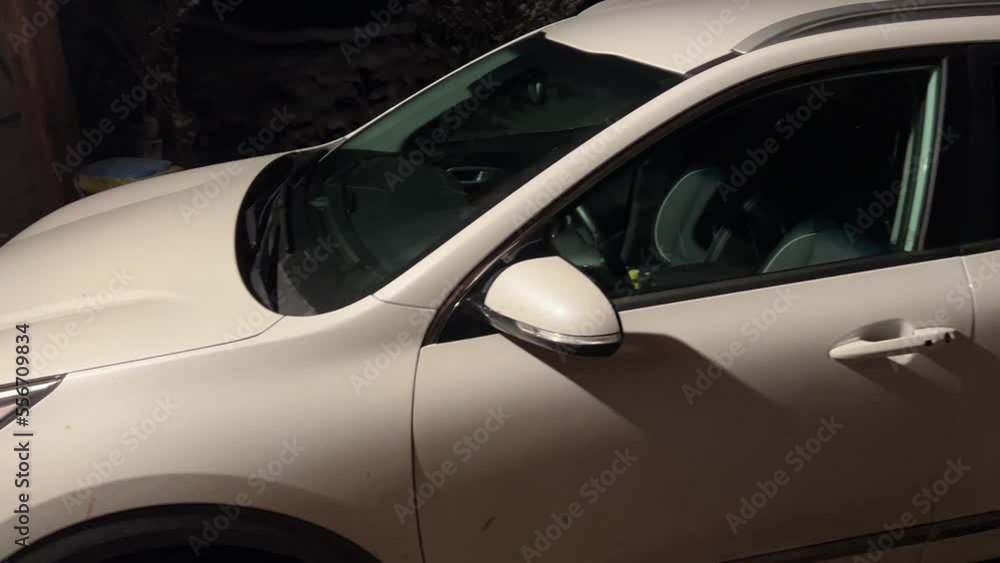 snow covered electric car at night snow covered electric car at night