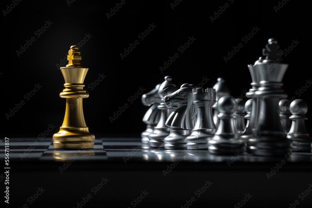 The chess king on the board is fighting with the opponent. business concept success concept The chess king on the board is fighting with the opponent. business concept success concept