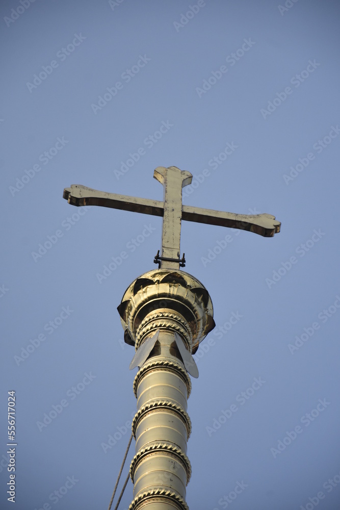 cross on the top of a church