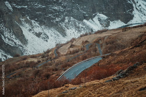 Curved roads on a mountain valley at Lahaul Spiti in Himachal Pradesh, India. Curved roads on a mountain during the winter season. Roads in the Himalayas during the winter season. Travel background. 