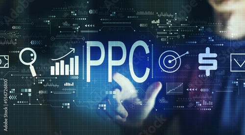 PPC - Pay per click concept with young man touching a digital screen at night