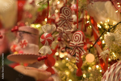 New Year. New Year's candies on the Christmas tree
