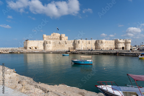 Citadel of the city of Alexandria, seen from the part of the sea full of ships, on a sunny day.