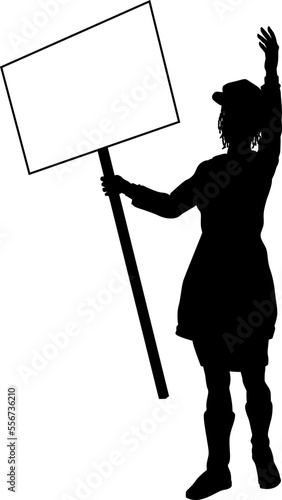Protestor or demonstrator at a demonstration march, picket line or strike protest rally in silhouette. Holding up a banner or picket sign board placard.
