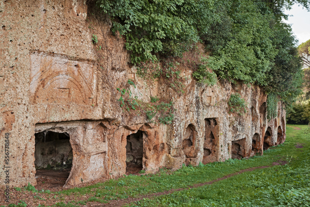 Sutri, Viterbo, Lazio, Italy: Etruscan archaeological site, the ancient necropolis, 2100 years old, with the tombs dug in the tufa rock Sutri, Viterbo, Lazio, Italy: Etruscan archaeological site, the ancient necropolis, 2100 years old, with the tombs dug in the tufa rock