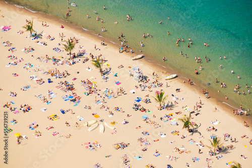 Oak Street beach with Lake Michigan, aerial view, people enjoying the sunny summer day outdoors, Chicago, Illinois, USA.