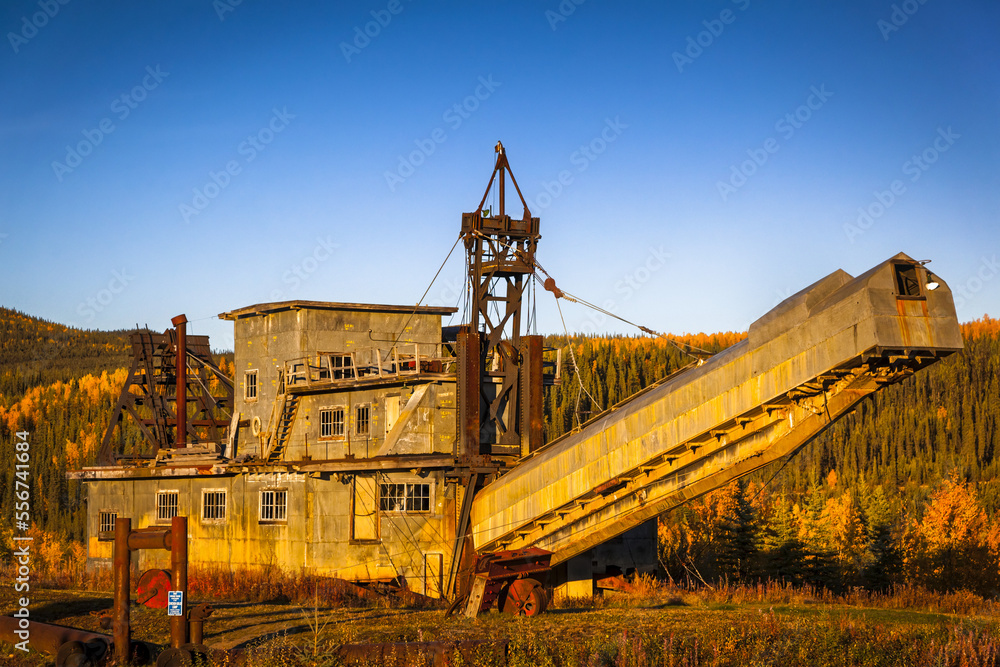 National Historical Site, the Pedro Dredge in warm sunset light, Interior Alaska in autumn; Chicken, Alaska, United States of America